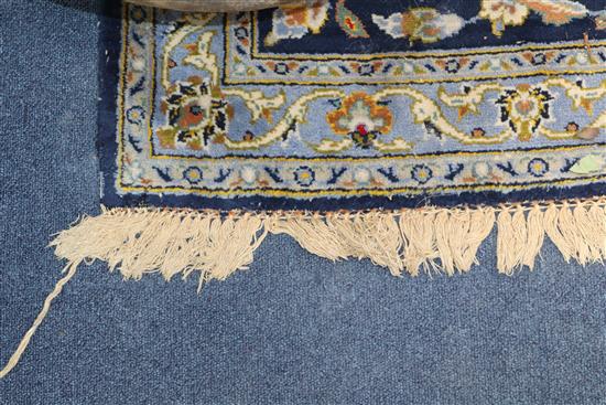 A Tabriz style blue ground carpet 388 x 279cm